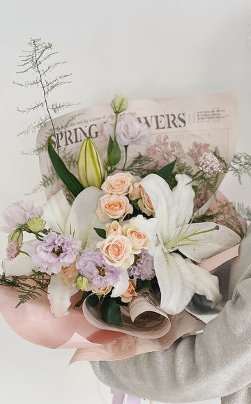 百年好合百合花花束，粉色包裝。